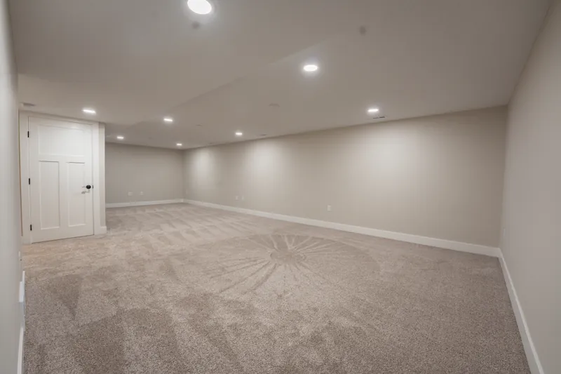 Finished basement room with new doors and trim
